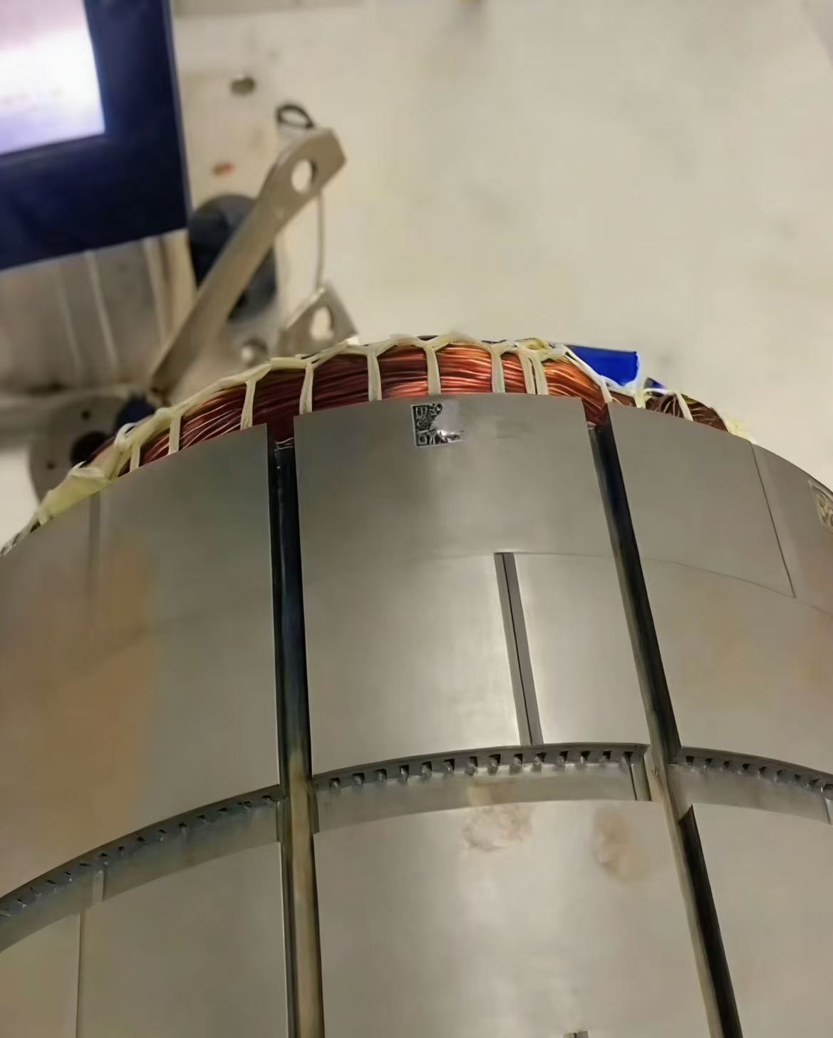 Precision part showing laser etched batch number and QR code for traceability