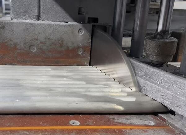 Precision-cut aluminum bar ends with smooth surfaces from YCS Machining's advanced sawing equipment