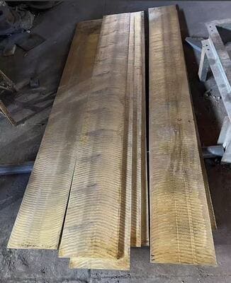 Tin Bronze material surface texture and grain structure showing wear resistance